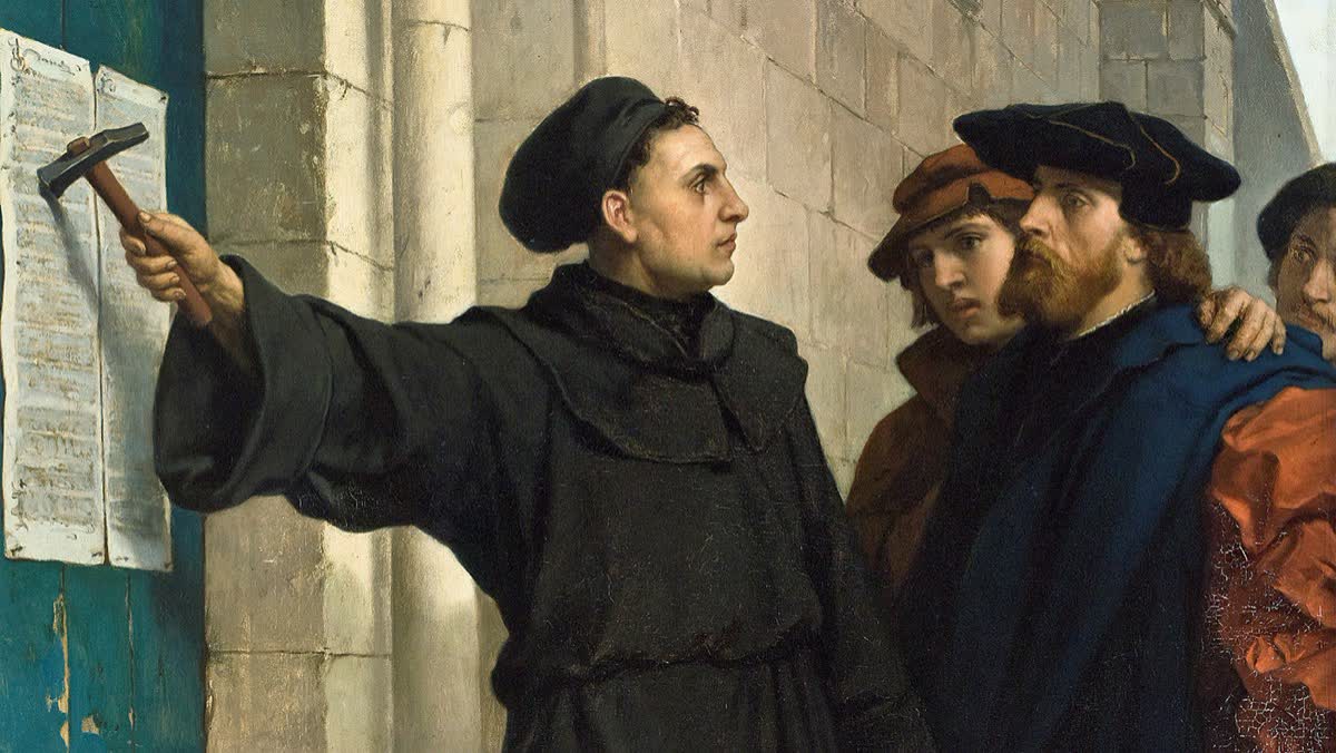 Painting of Martin Luther using a hammer to nail a printed paper to a heavy wooden church door. He wears a dark monk's robe; townspeople stand behind him watching.